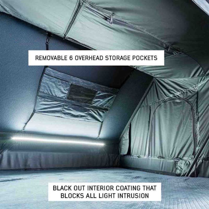 overland-vehicle-systems-xd-everest-cantilever-aluminum-roof-top-tent-gray-body-black-rainfly-open-interior-view-with-removable-storage-pockets