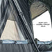 overland-vehicle-systems-xd-everest-cantilever-aluminum-roof-top-tent-gray-body-black-rainfly-open-interior-view-with-support-poles-on-white-background