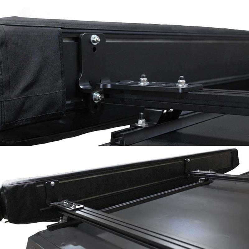 overland-vehicle-systems-xd-nomadic-270-degree-awning-black--black-closed-close-up-view-with-mounting-rails-on-white-background