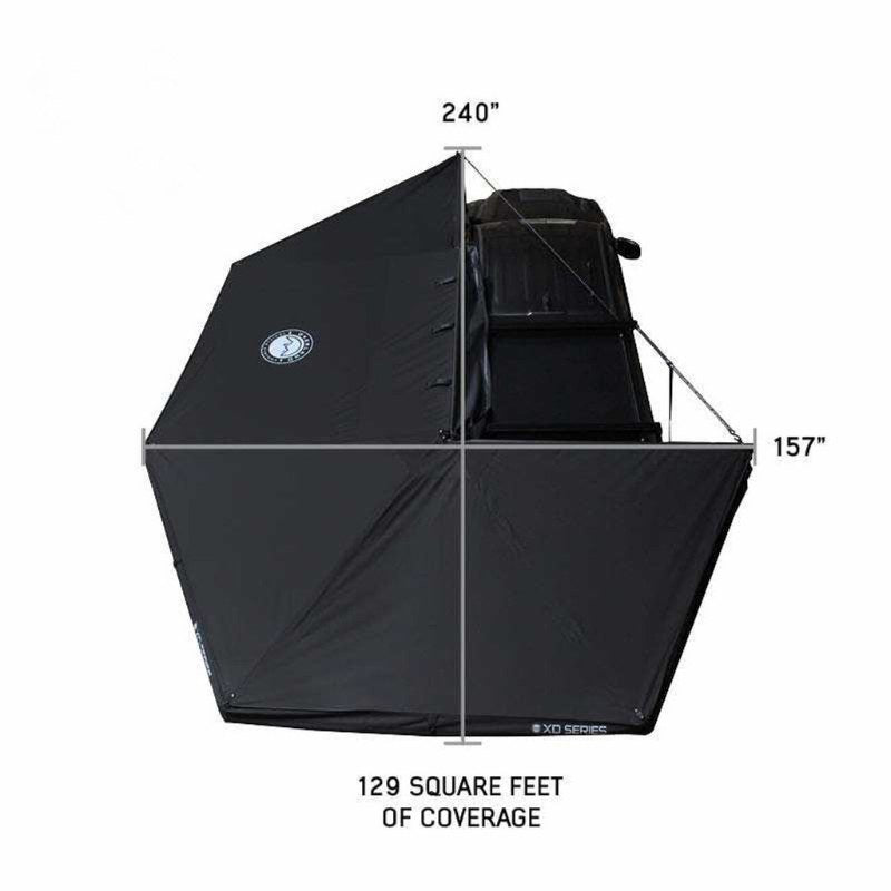 overland-vehicle-systems-xd-nomadic-270-degree-awning-black-awning-coverage-drone-view-on-vehicle-on-white-background