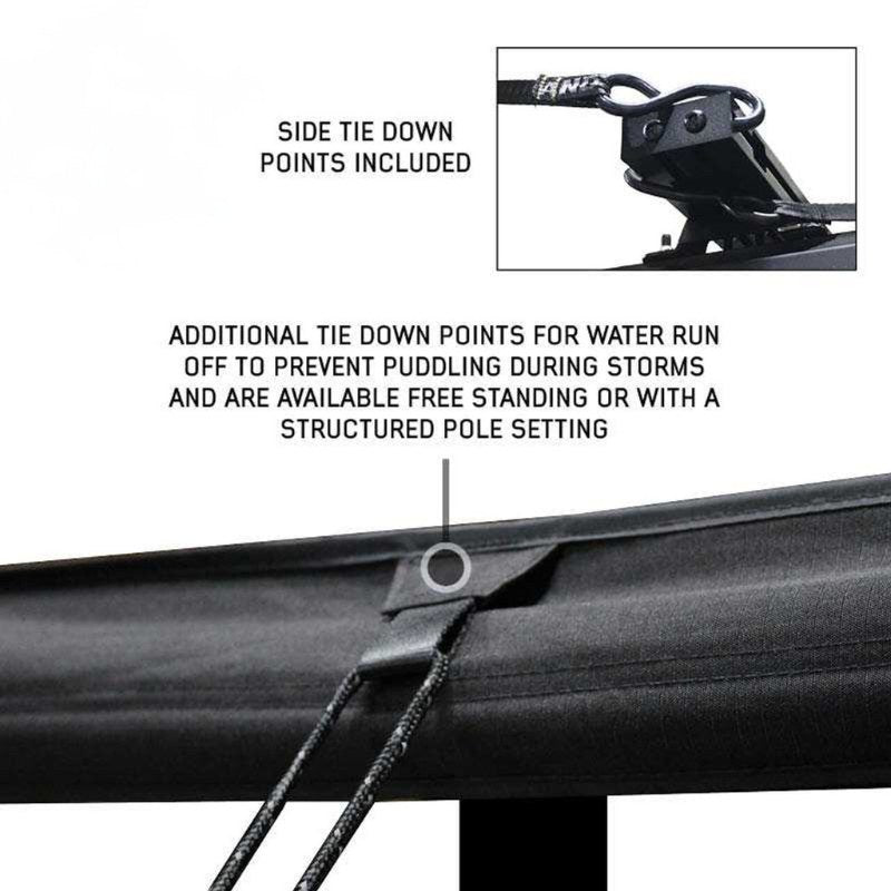 overland-vehicle-systems-xd-nomadic-270-degree-awning-black-close-up-view-with-tie-down-points-on-white-background