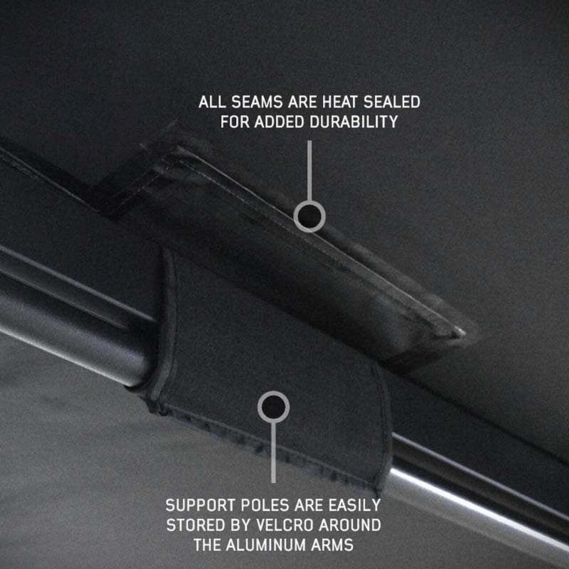 overland-vehicle-systems-xd-nomadic-270-degree-awning-black-close-up-view-with-velcro-strap-around-aluminum-arms