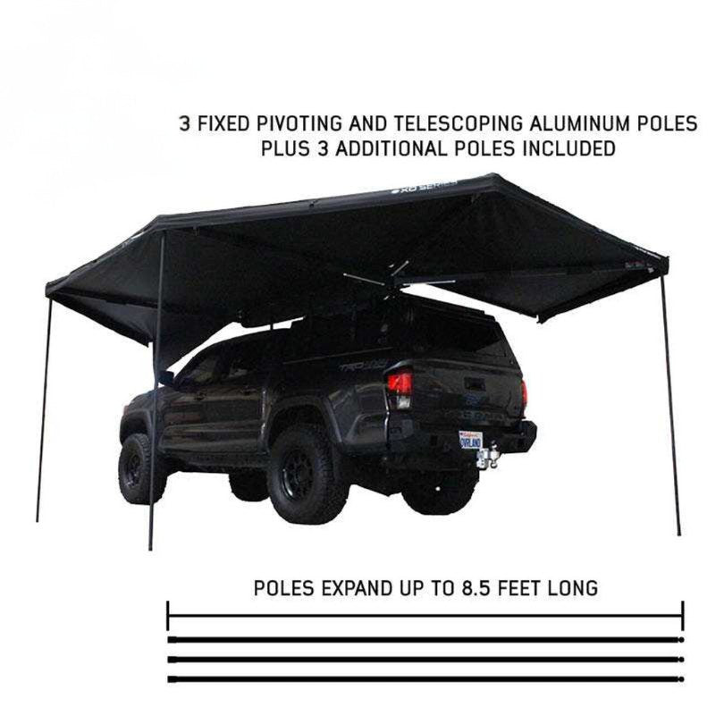 overland-vehicle-systems-xd-nomadic-270-degree-awning-black-interior-view-on-toyota-tacoma-with-telescopic-aluminum-poles-on-white-background