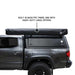 overland-vehicle-systems-xd-nomadic-270-degree-awning-black-side-view-on-toyota-tacoma-with-awning-travel-bag-on-white-background
