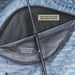 overland-vehicle-systems-xd-sherpa-soft-shell-rooftop-tent-gray-body-black-rainfly-open-close-up-view-window-details