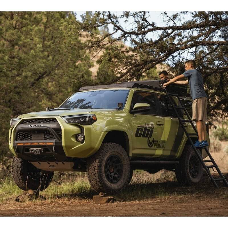 prinsu-toyota-4runner-roof-rack-full-non-drill-front-corner-view-on-vehicle-with-closed-roof-top-tent-in-nature