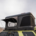 prinsu-toyota-4runner-roof-rack-full-non-drill-side-view-on-vehicle-with-open-roof-top-tent-in-nature