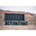 roam-128l-rolling-rugged-case-slate-open-front-corner-view-on-terrain