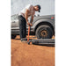 roam-7-gallon-water-tank-close-up-view-with-person-pumping-on-terrain