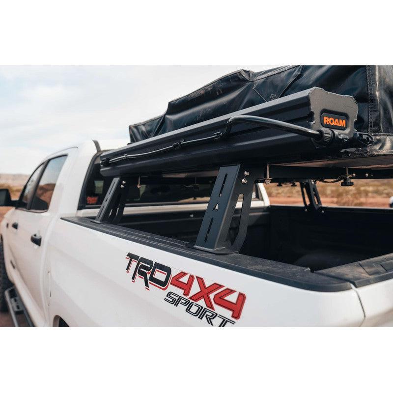 roam-7-gallon-water-tank-front-corner-view-on-vehicle-on-terrain