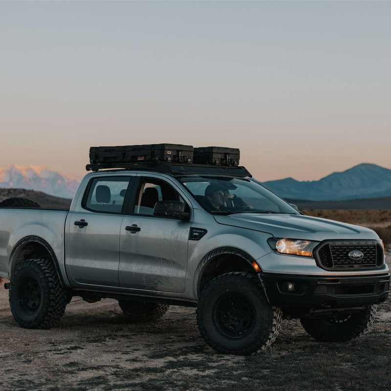 roam-83l-rugged-mounts-under-rugged-case-on-ford-ranger-in-terrain