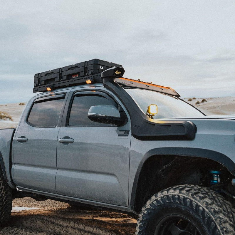 roam-83l-rugged-mounts-under-rugged-case-on-ford-ranger-on-terrain