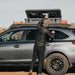 roam-95l-lid-organizer-front-view-on-rugged-case-with-person-on-vehicle