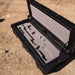 roam-95l-rugged-case-foam-insert-front-corner-view-in-rugged-case-on-desert