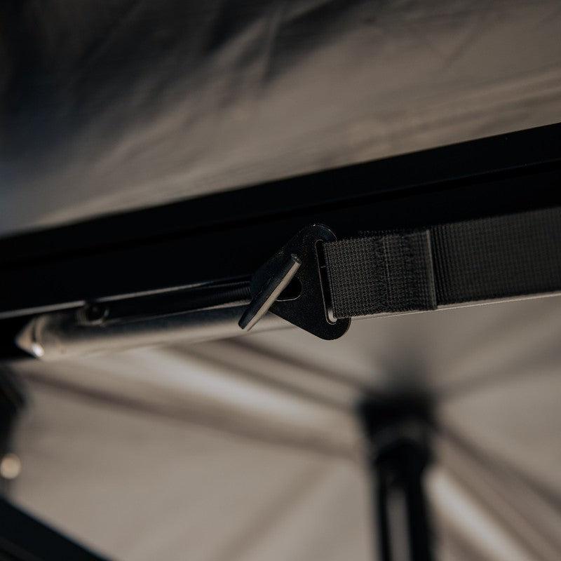 roam-arc-270-awning-open-close-up-view-strap-with-arm-tie-down-point