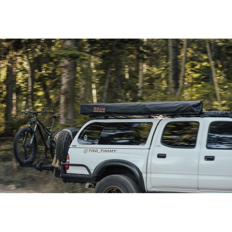 roam-arc-270-awning-passenger-side-closed-side-view-with-road-cover-in-nature