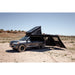 roam-arc-270-awning-wall-kit-front-corner-view-with-rooftop-tent-in-terrain