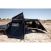 roam-arc-270-awning-wall-kit-side-view-with-rolled-up-walls-in-nature