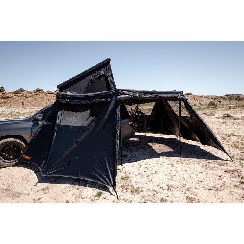roam-arc-270-awning-wall-kit-side-view-with-rolled-up-walls-in-nature