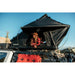 roam-desperado-hardshell-rooftop-tent-open-side-view-with-person-in-nature
