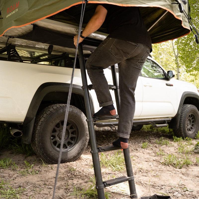 roam-ladder-soft-steps-front-corner-view-with-person-in-nature