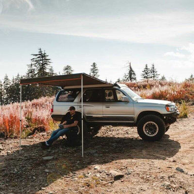 roam-rooftop-awnings-open-front-corner-view-on-vehicle-in-nature