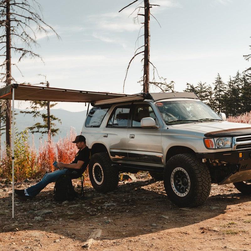 roam-rooftop-awnings-open-side-view-on-vehicle-in-nature