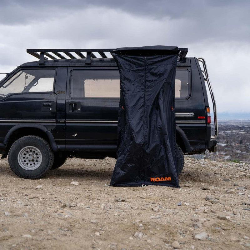 roam-shower-room-front-view-on-vehicle-in-nature