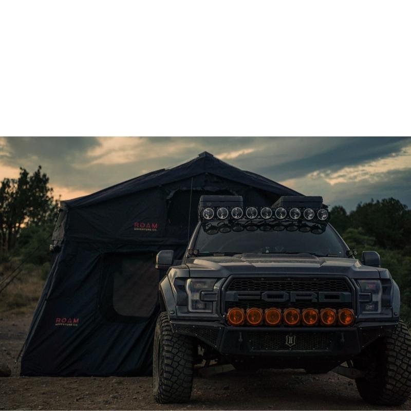 roam-vagabond-xl-rooftop-tent-black-open-side-view-on-ford-ranger-with-annex-in-nature