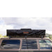 roam-vagabond-xl-rooftop-tent-closed-front-view-on-toyota-land-cruiser-with-rugged-cover-in-nature