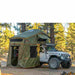 roam-vagabond-xl-rooftop-tent-forest-green-hyper-orange-open-front-corner-view-on-jeep-wrangler-rubicon-with-annex-in-nature