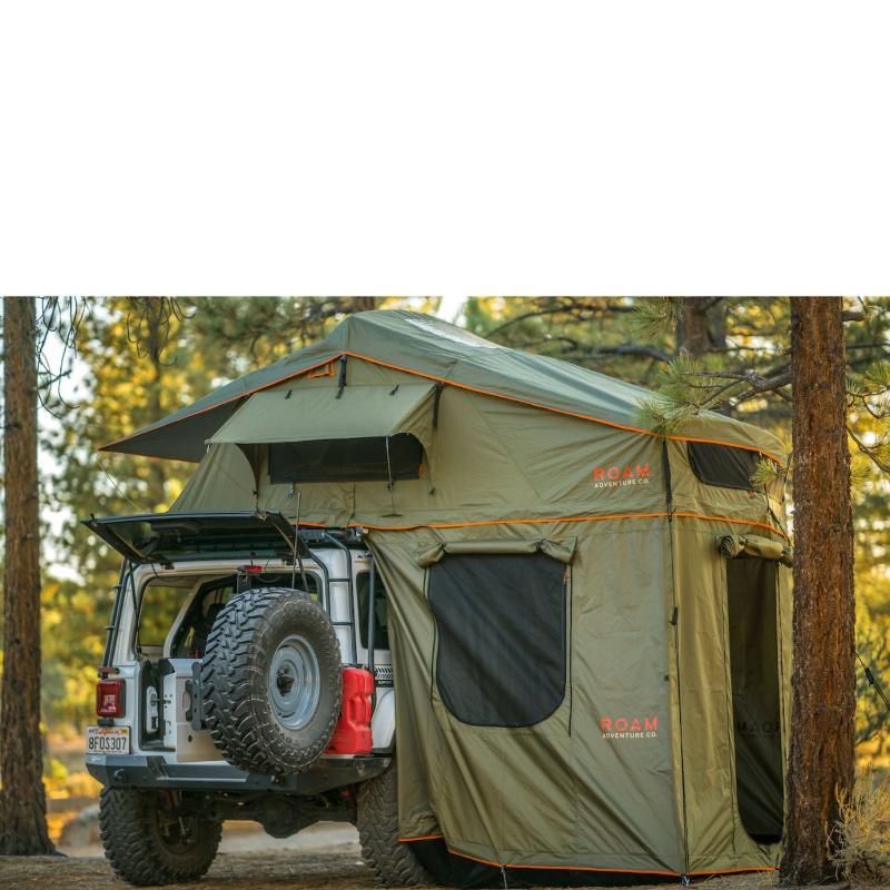 roam-vagabond-xl-rooftop-tent-forest-green-hyper-orange-open-side-view-on-jeep-wrangler-rubicon-with-annex-in-nature