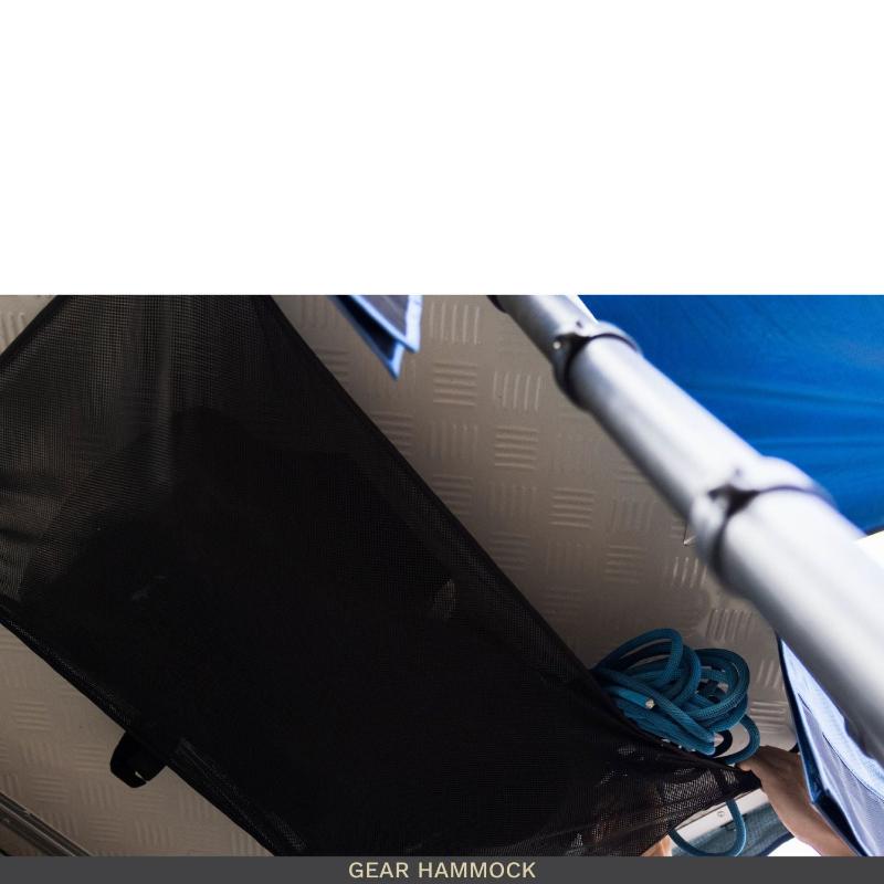 roam-vagabond-xl-rooftop-tent-slate-gray-navy-blue-open-bottom-view-with-gear-hammock-in-nature