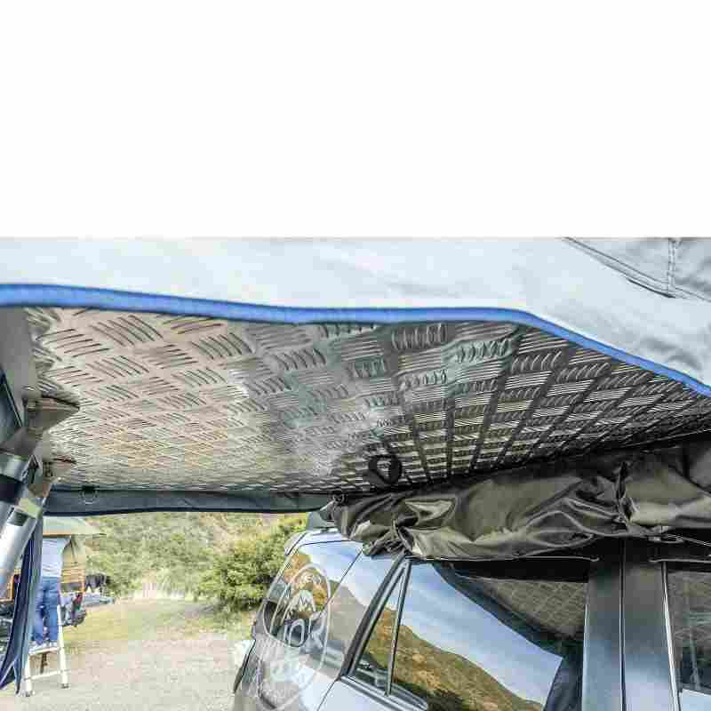 roam-vagabond-xl-rooftop-tent-slate-gray-navy-blue-open-close-up-view-with-aluminum-base-in-nature