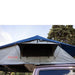 roam-vagabond-xl-rooftop-tent-slate-gray-navy-blue-open-side-view-on-toyota-land-cruiser-with-rainfly-in-nature