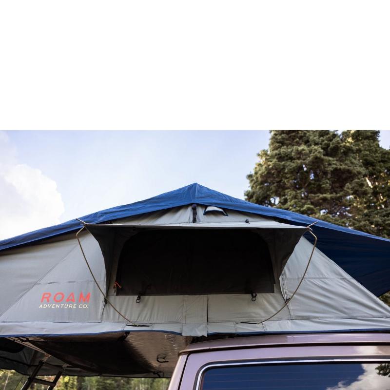 roam-vagabond-xl-rooftop-tent-slate-gray-navy-blue-open-side-view-on-toyota-land-cruiser-with-rainfly-in-nature