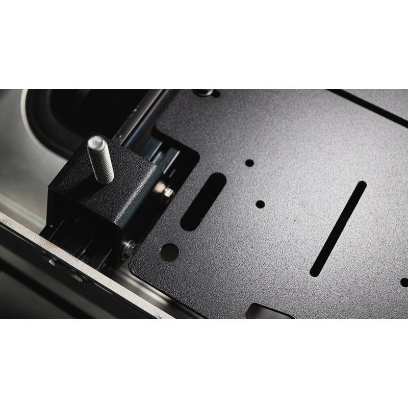sherpa-adapt-plate-large-close-up-view-with-bolt-on-vehicle-in-nature