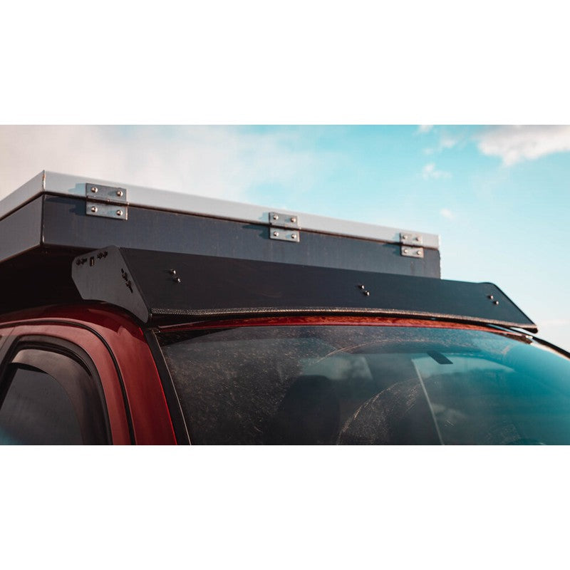 sherpa-animas-2005-2023-tacoma-camper-roof-rack-close-up-view-on-red-tacoma-in-nature