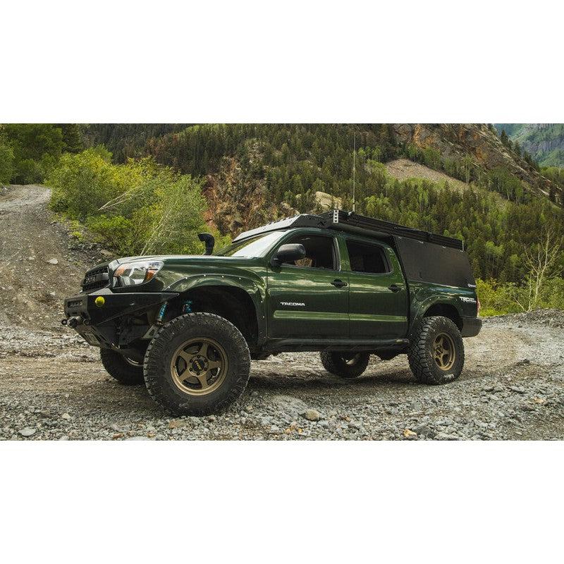 sherpa-animas-2005-2023-tacoma-camper-roof-rack-front-corner-view-in-nature