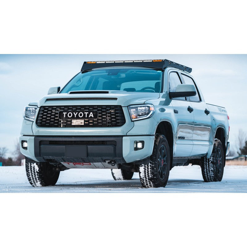 sherpa-big-bear-roof-rack-for-2007-2021-tundra-crewmax-front-view-on-snowy-field