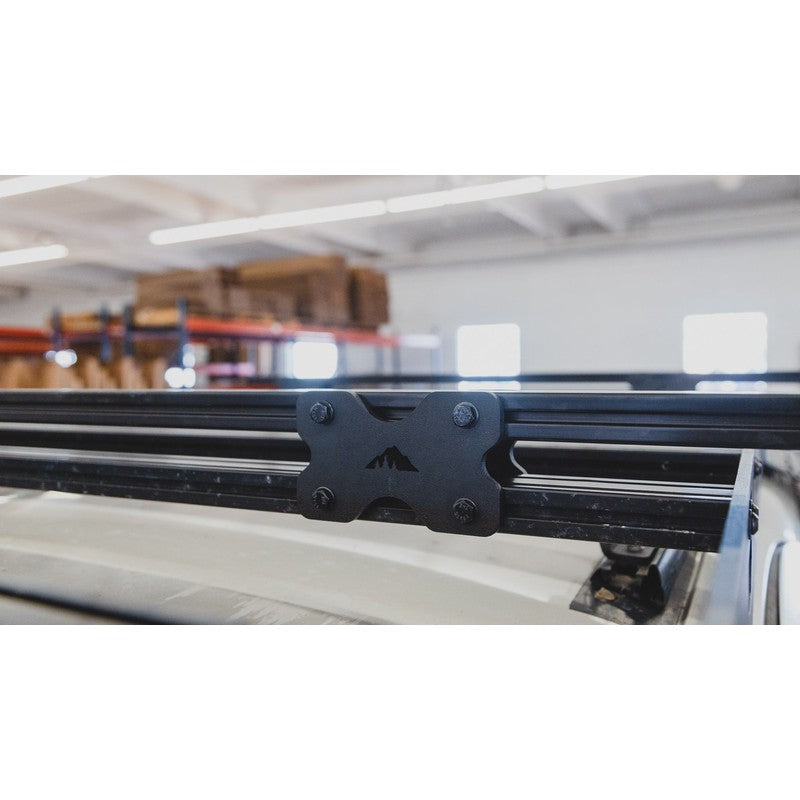sherpa-crossbar-riser-front-view-on-vehicle-in-garage