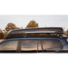 sherpa-crossbar-riser-side-view-on-vehicle-with-cargo-box-in-nature