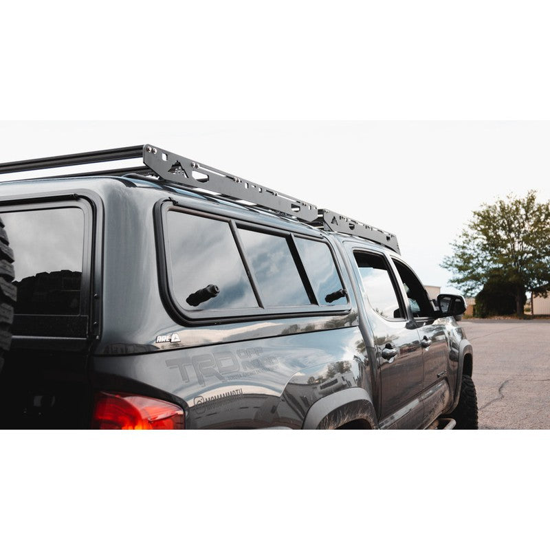 sherpa-crows-nest-truck-topper-rear-corner-view-on-parking-lot