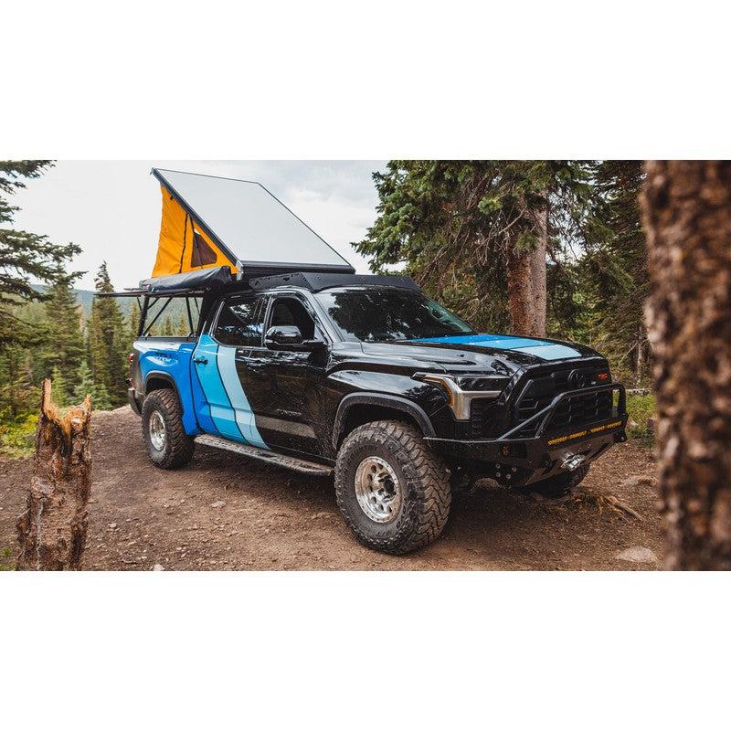 sherpa-cub-roof-rack-for-2022-2023-tundra-camper-front-corner-view-with-roof-top-tent-in-forest