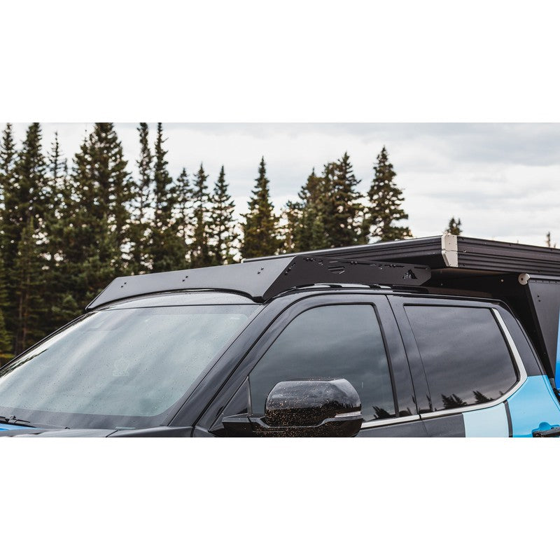 sherpa-cub-roof-rack-for-2022-2023-tundra-camper-front-corner-view-with-wind-fairing-in-nature