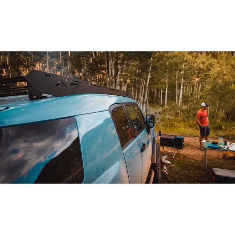 sherpa-fuji-roof-rack-for-2007-2014-fj-cruiser-side-view-with-person-in-nature