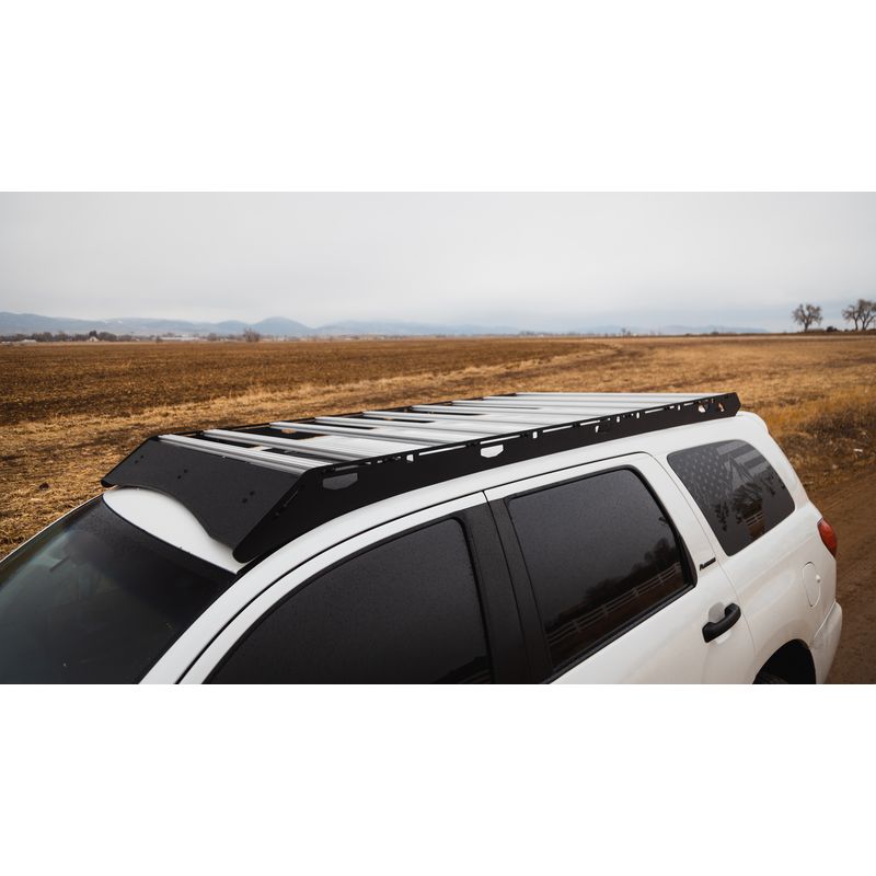 sherpa-harvard-roof-rack-for-2008-2022-toyota-sequoia-front-corner-view-with-fairing-in-nature