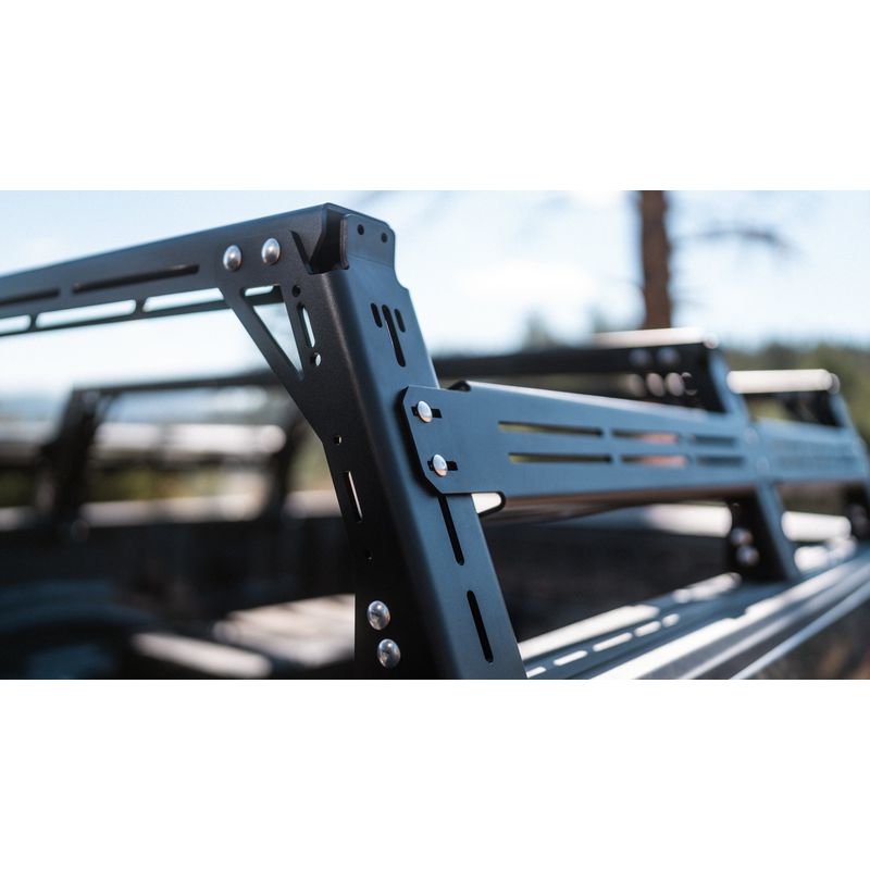 sherpa-mid-height-pak-system-bed-rack-close-up-view-on-vehicle-in-nature
