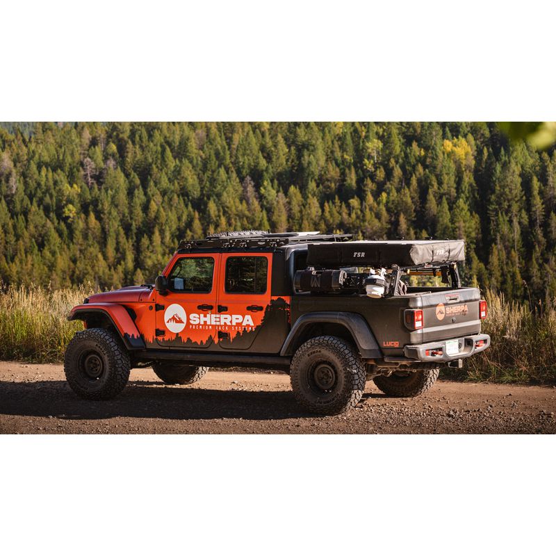 sherpa-mid-height-pak-system-bed-rack-rear-corner-view-on-jeep-gladiator-in-nature