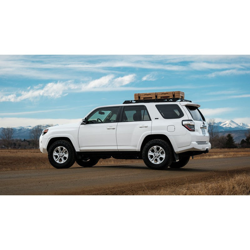 sherpa-needle-roof-rack-for-2010-2024-4runner-rear-corner-view-with-roam-case-in-nature